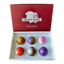 Load image into Gallery viewer, Box of colorful chocolates with 'Chocolate Escapade' branding on a white background