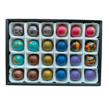 Load image into Gallery viewer, Box of assorted colorful chocolates on a white background
