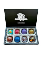 Load image into Gallery viewer, Box of colorful chocolates with Chocolate Escapade branded lid on a white background
