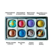Load image into Gallery viewer, Box of chocolates with colorful toppings and names on a white background

