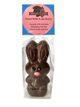 Load image into Gallery viewer, Chocolate easter bunny in packaging with a white background
